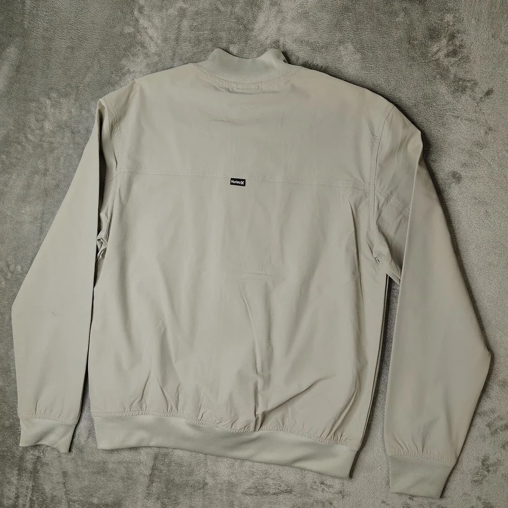 Hurley Exist Bomber Jacket Mens Small Sandstorm Tan Full Zip Stretch Performance